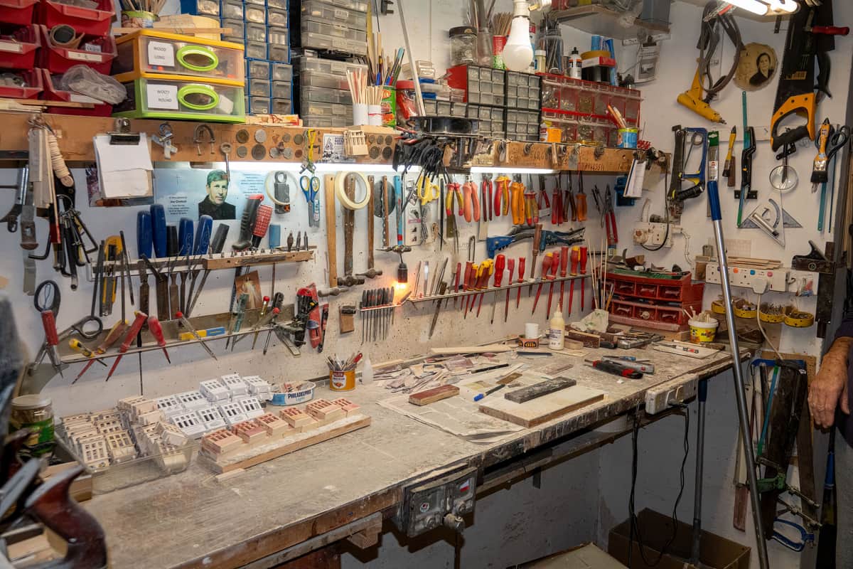 Tools laid out side by side on a workbench for comparison