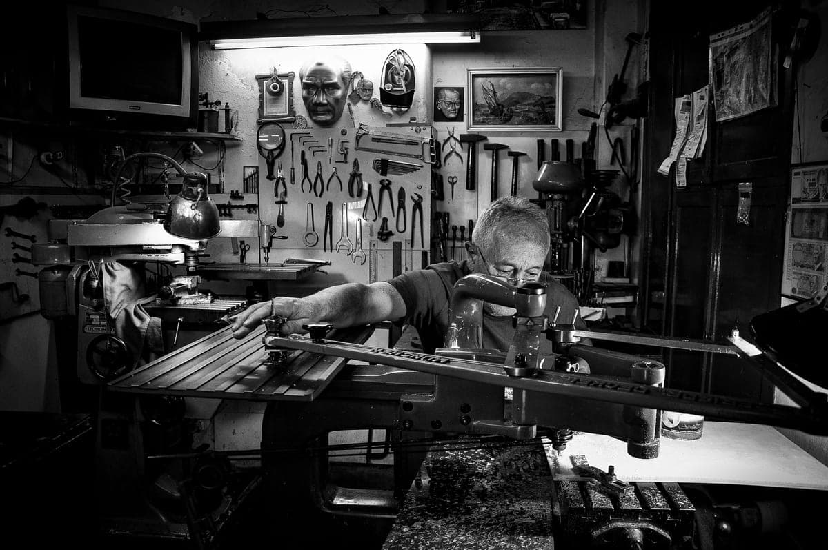 Someone working in a home garage workshop